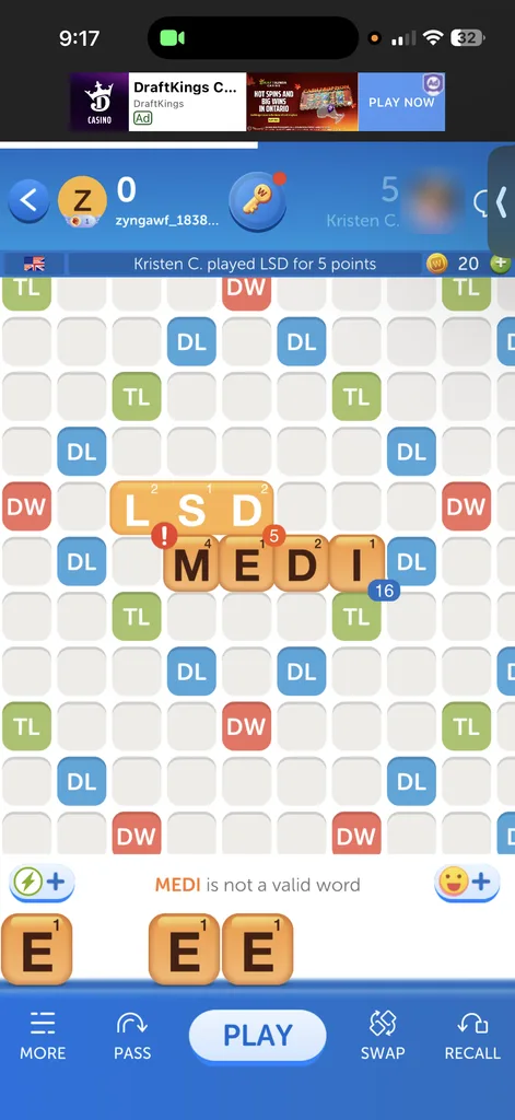First move attempt showing a casino banner ad at the top, an invalid word message and a 16 point preview